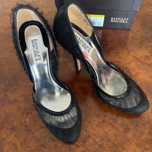 Evening shoe size7 . Black mesh over black satin. 4” heel